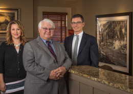 Joel Adams and associates in office