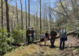 Mayland Early College students on trail beside creek