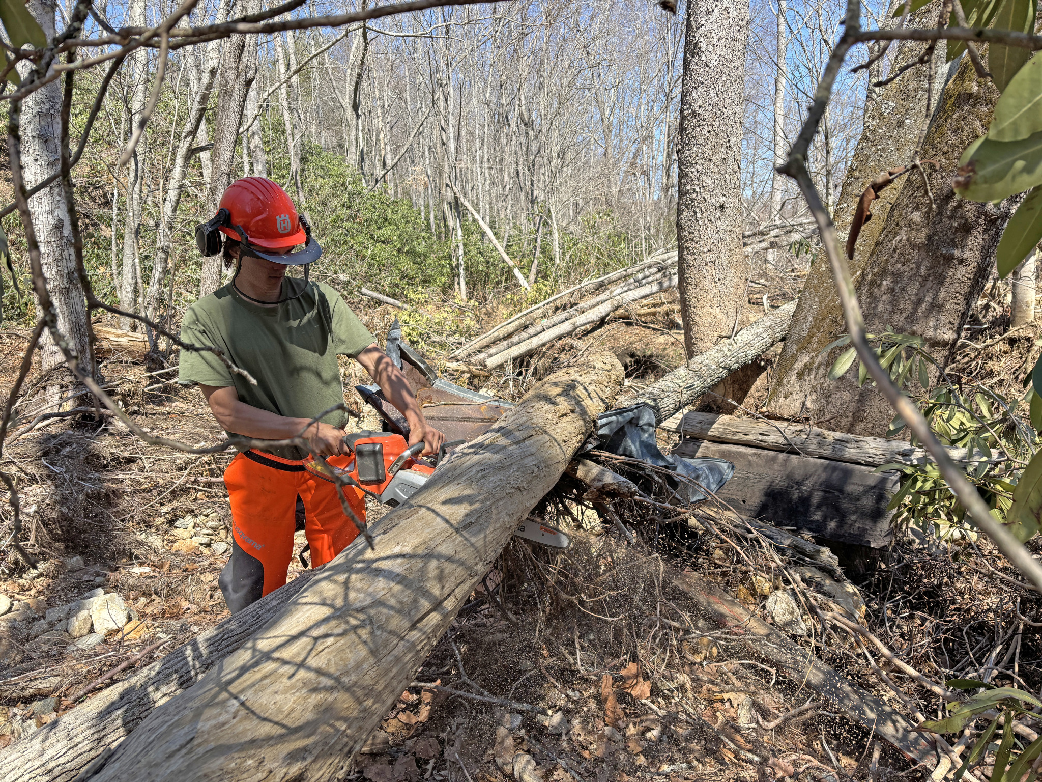 Helene Recovery Volunteer with chainsaw